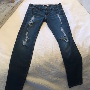 Mid Rise Ripped Skinny Jeans